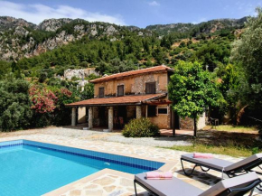 Stone house in Faralya